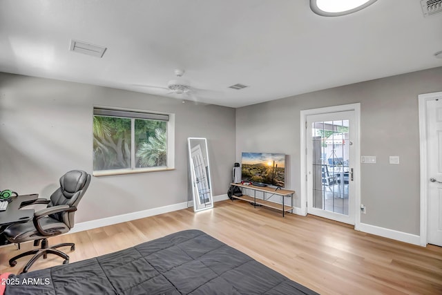 2405 E Lynwood Cir, Mesa, AZ 85213 - office area with wood finished floors, baseboards, and a ceiling fan