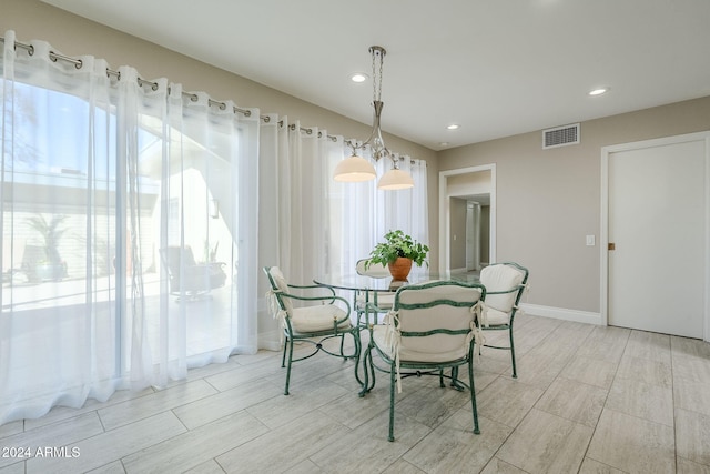 dining area with light hardwood / wood-style flooring