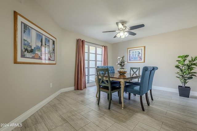 dining room featuring ceiling fan