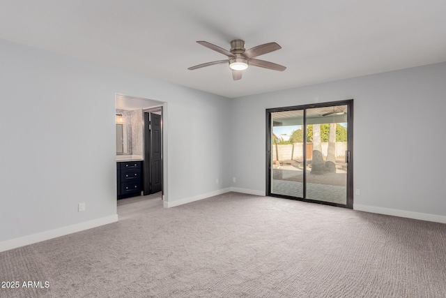 unfurnished bedroom featuring connected bathroom, carpet flooring, access to outside, and ceiling fan