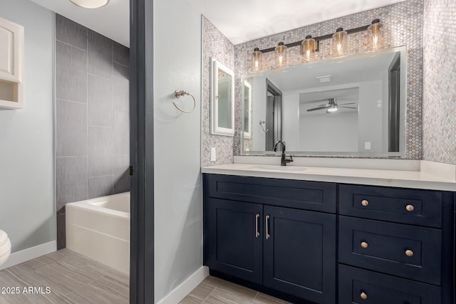 full bathroom with vanity, bathtub / shower combination, and toilet