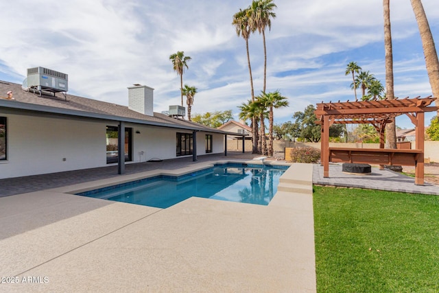 view of pool featuring central AC, a pergola, and a patio