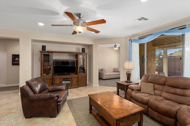 living room featuring ceiling fan