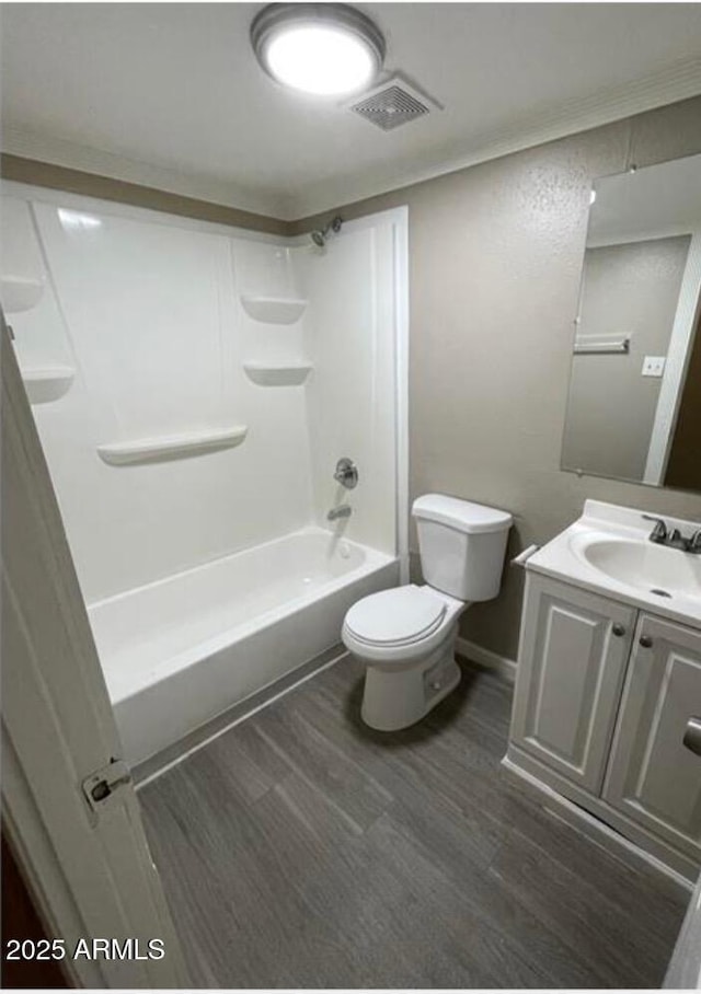 5420 W Lynwood St, Phoenix, AZ 85043 - bathroom featuring toilet, visible vents, wood finished floors, and vanity
