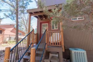 3458 N Meadow Dr, Pine, AZ 85544 - view of playground featuring stairs and central AC
