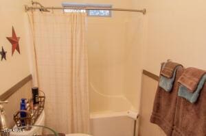 3458 N Meadow Dr, Pine, AZ 85544 - bathroom with toilet and shower / bathtub combination with curtain