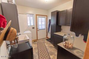 3458 N Meadow Dr, Pine, AZ 85544 - laundry room with separate washer and dryer and cabinet space