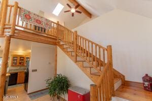 3458 N Meadow Dr, Pine, AZ 85544 - staircase with ceiling fan, beamed ceiling, wood finished floors, and high vaulted ceiling