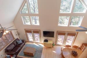 3458 N Meadow Dr, Pine, AZ 85544 - living room with a high ceiling, french doors, plenty of natural light, and ceiling fan