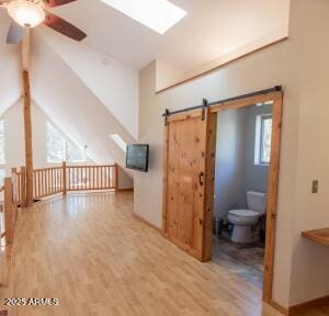 3458 N Meadow Dr, Pine, AZ 85544 - bonus room with ceiling fan, wood finished floors, a barn door, and lofted ceiling