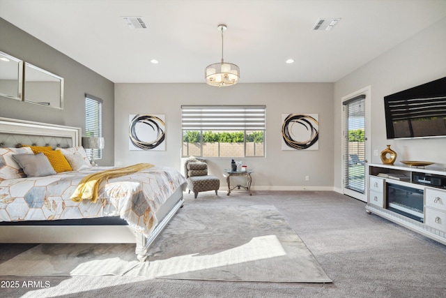 23060 E Sonoqui Blvd, Queen Creek, AZ 85142 - carpeted bedroom with multiple windows, access to exterior, and recessed lighting