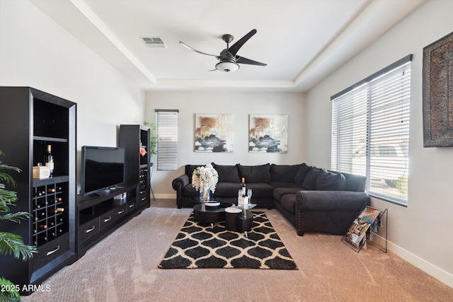 23060 E Sonoqui Blvd, Queen Creek, AZ 85142 - living room with ceiling fan, carpet, and a tray ceiling