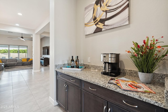 23060 E Sonoqui Blvd, Queen Creek, AZ 85142 - indoor dry bar featuring a ceiling fan, light tile patterned flooring, and recessed lighting
