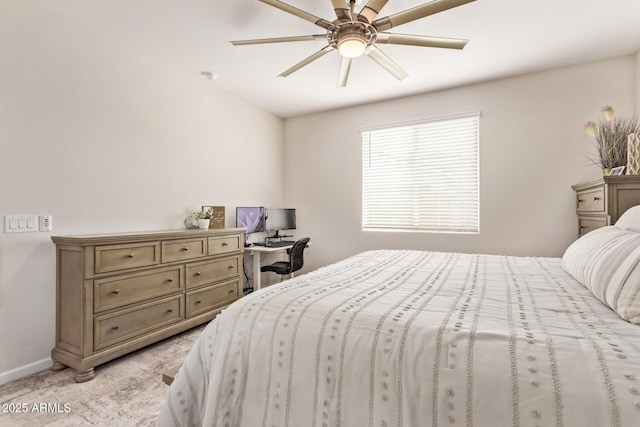 bedroom featuring baseboards, light carpet, and a ceiling fan