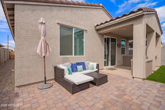 view of patio / terrace with outdoor lounge area and a fenced backyard