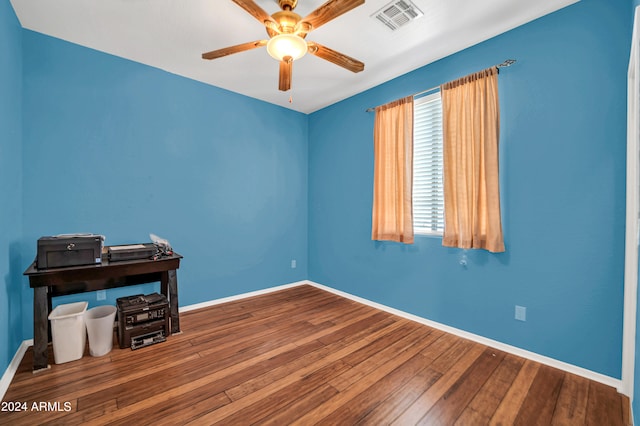 interior space featuring ceiling fan and hardwood / wood-style floors