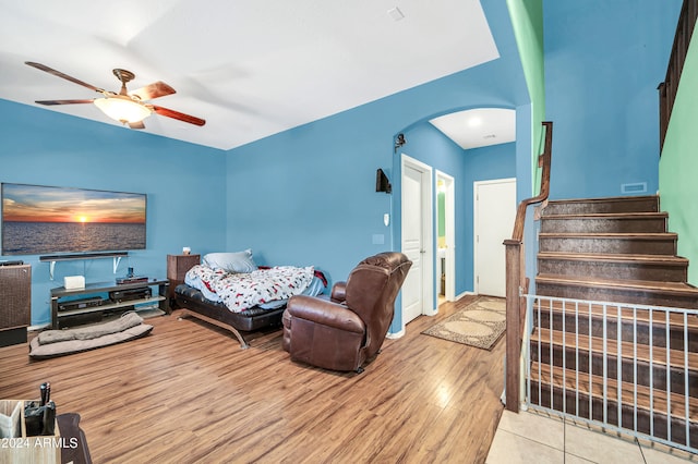 bedroom featuring ceiling fan and light hardwood / wood-style floors