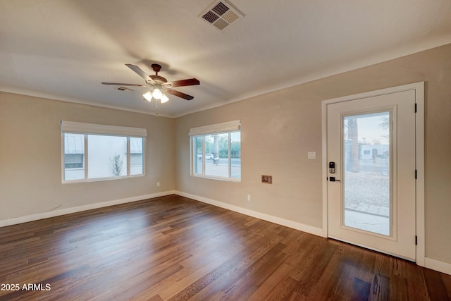 interior space with dark hardwood / wood-style flooring and ceiling fan