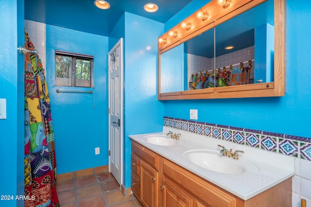 bathroom with vanity and tile patterned floors