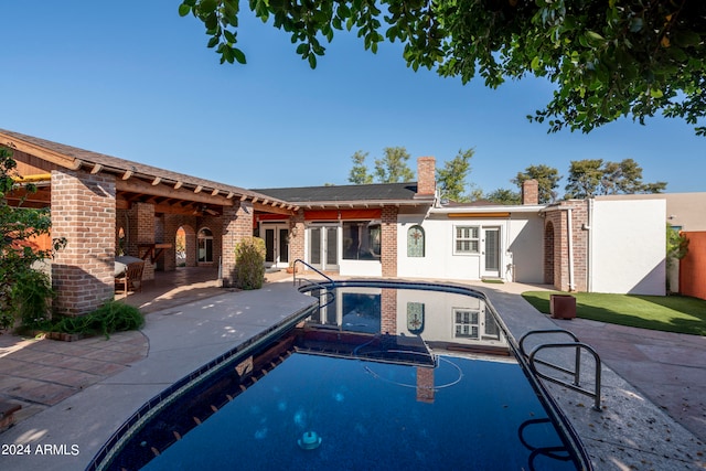 view of pool with a patio area