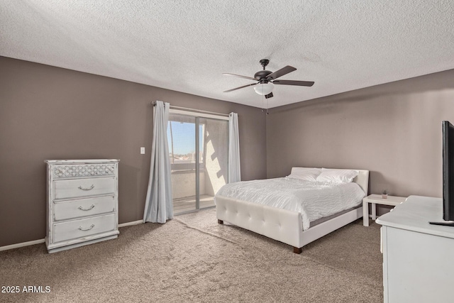 unfurnished bedroom with ceiling fan, access to exterior, carpet, and a textured ceiling