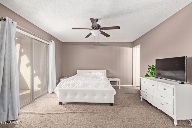 bedroom featuring light carpet, ceiling fan, access to outside, and a textured ceiling