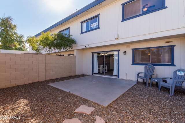 rear view of house featuring a patio