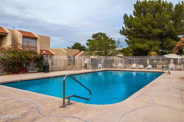 view of pool featuring a patio