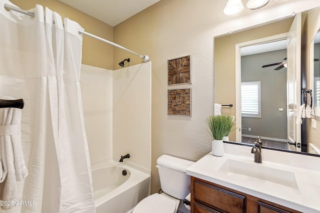 full bathroom with shower / bath combo, ceiling fan, toilet, and vanity