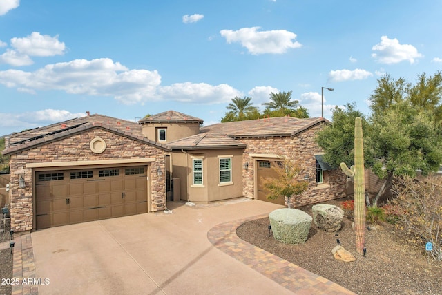 view of front of property with a garage