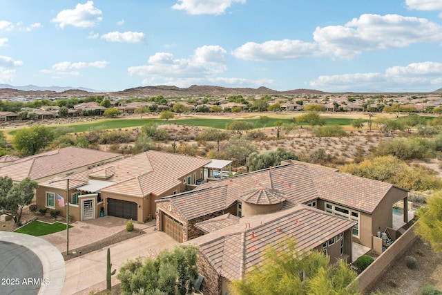 bird's eye view with a mountain view