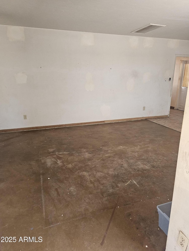 1630 E Catalina Dr, Phoenix, AZ 85016 - empty room with concrete floors and baseboards
