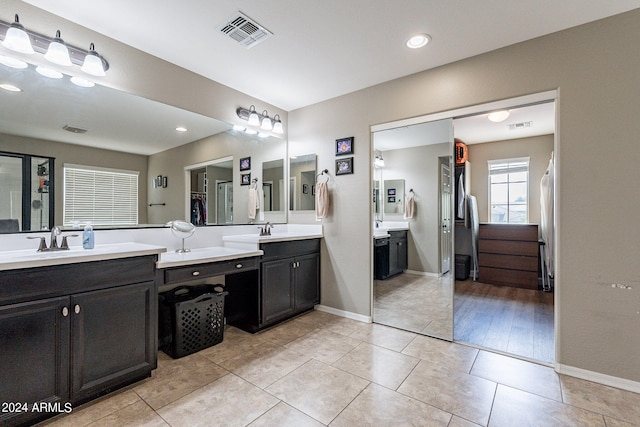 bathroom with vanity and hardwood / wood-style flooring