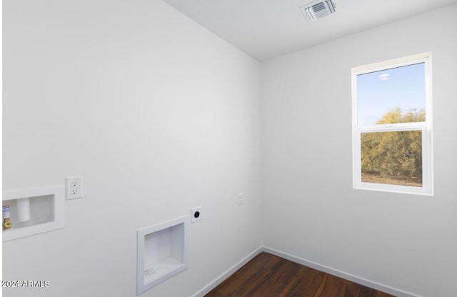 laundry room with hookup for a washing machine, dark hardwood / wood-style floors, and electric dryer hookup