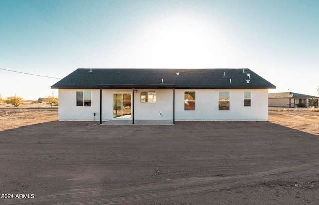 back of property featuring a patio area