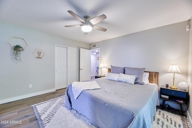 8049 N 16th Ave, Phoenix, AZ 85021 - bedroom with baseboards, wood finished floors, a closet, and ceiling fan