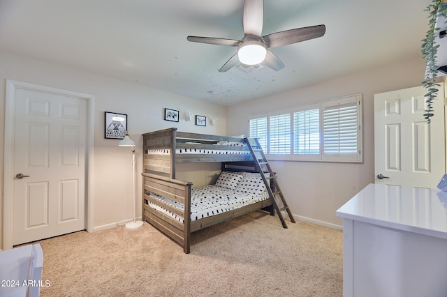 8049 N 16th Ave, Phoenix, AZ 85021 - bedroom with light colored carpet, baseboards, and a ceiling fan