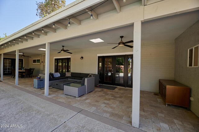8049 N 16th Ave, Phoenix, AZ 85021 - view of patio with french doors, a ceiling fan, outdoor lounge area, and outdoor dining space
