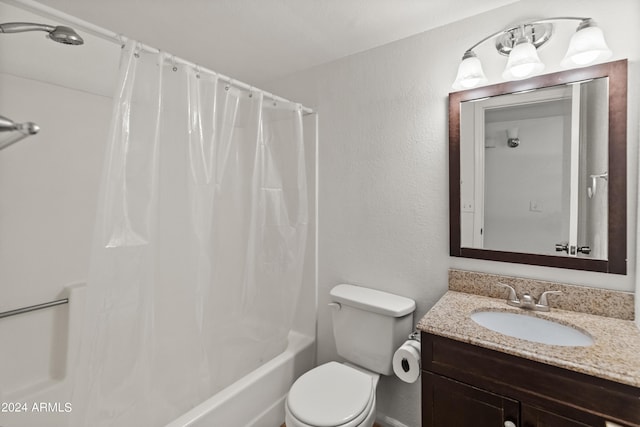 full bathroom with shower / tub combo, vanity, and toilet