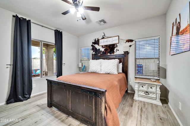 bedroom featuring ceiling fan and light wood-type flooring