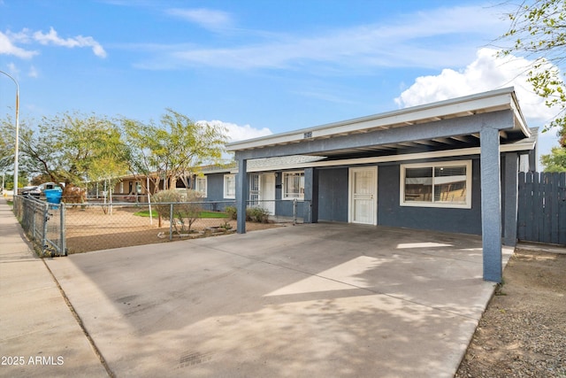 view of front of house featuring a carport