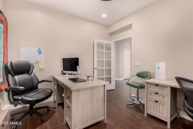 office space featuring french doors and dark hardwood / wood-style floors