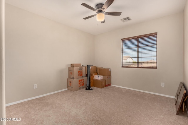 miscellaneous room featuring light carpet and ceiling fan