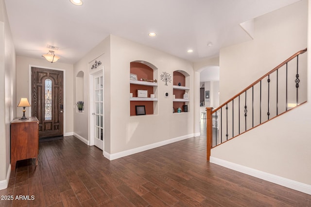 foyer featuring dark hardwood / wood-style floors