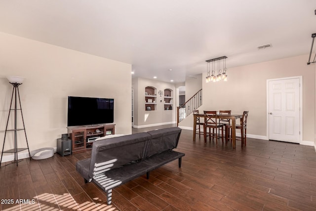 living room with built in shelves