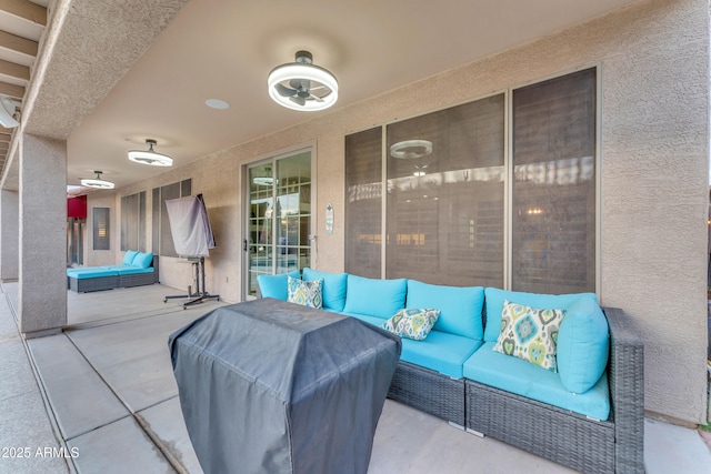 view of patio featuring a grill and outdoor lounge area