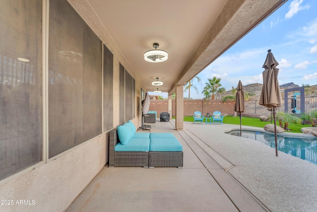 view of pool featuring a patio area