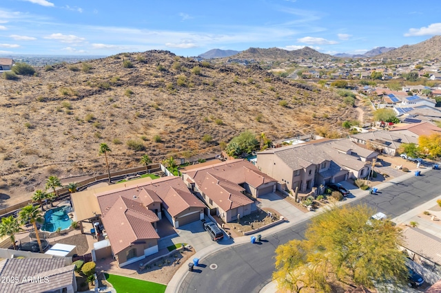 bird's eye view with a mountain view