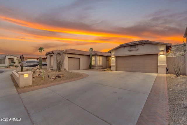 view of front of property featuring a garage