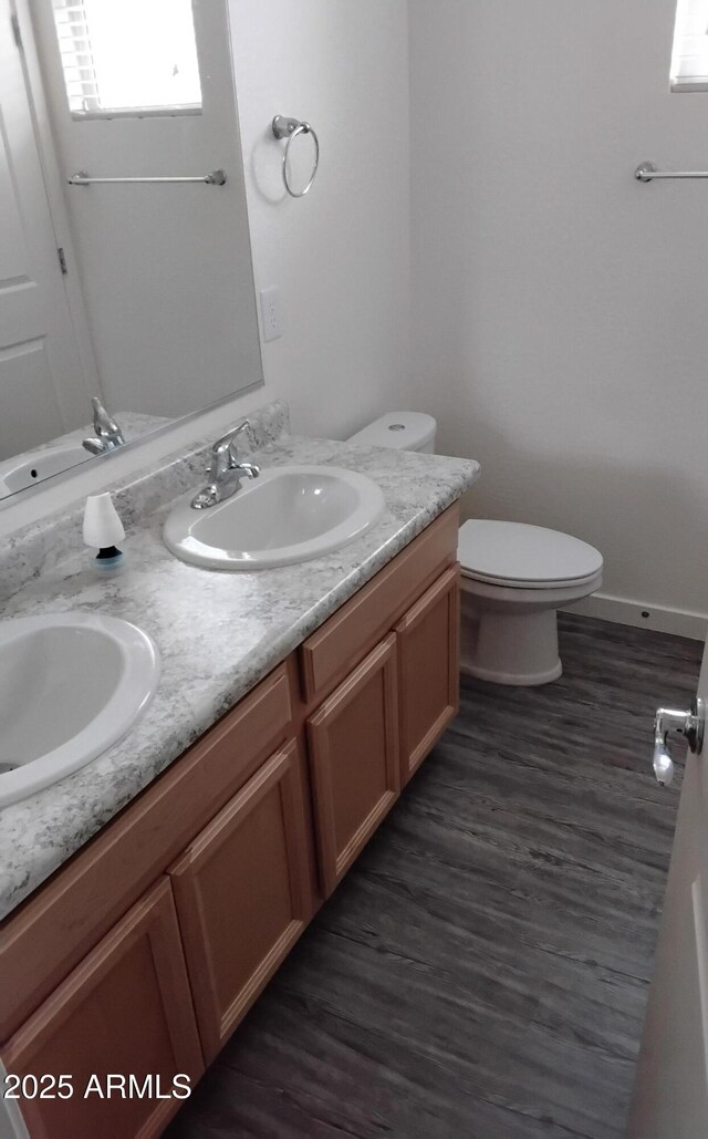 7284 E Gamebird Way, San Tan Valley, AZ 85143 - bathroom with double vanity and wood finished floors